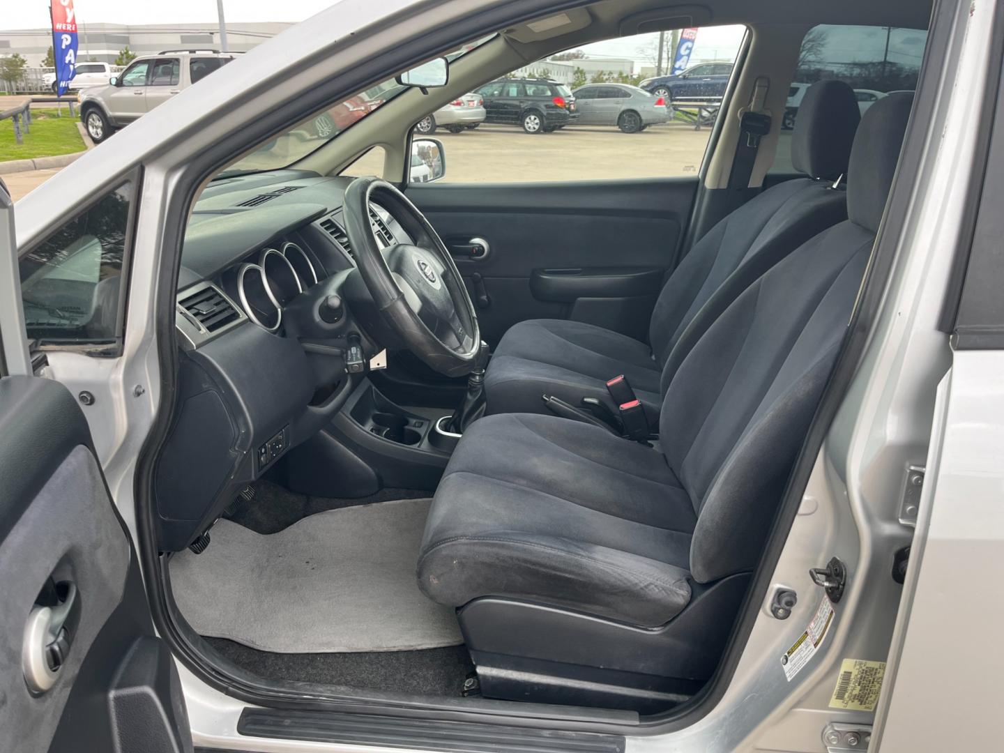 2009 SILVER /black Nissan Versa 1.8 S Hatchback (3N1BC13E09L) with an 1.8L L4 DOHC 16V engine, Manual transmission, located at 14700 Tomball Parkway 249, Houston, TX, 77086, (281) 444-2200, 29.928619, -95.504074 - Photo#8